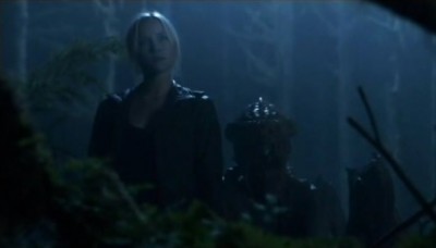 Falling Skies S3x02 - Karen looks on as Maggie escorts Hal from the forest