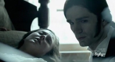 Being Human S3x10 - Aidan looks at the dead child wrapped in cloth as Susanna looks on