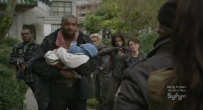 Continuum S1x04 - Travis and Liber8 hold an inncocent baby hostage
