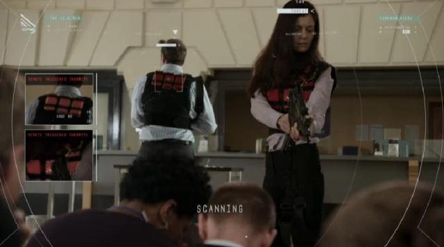 ContinuumS03X03 Kiera uses her tech to examine the robbers vests