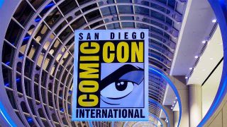 San Diego Comic Con Logo - Click to follow Comic-Con International on Twitter!