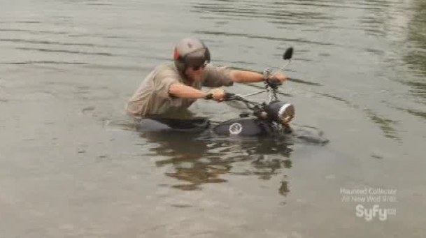 Destination Truth S5x1 Josh Gates Pushing Motorcycle out of River