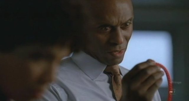 Fringe S3x19 - Broyles and red vines swirl