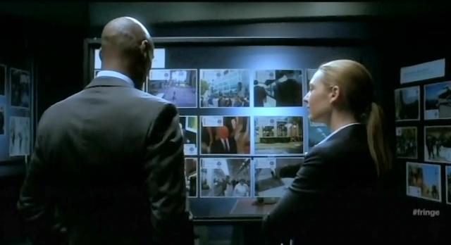 Fringe S4x10 Oliva and Broyles looking at the Observers