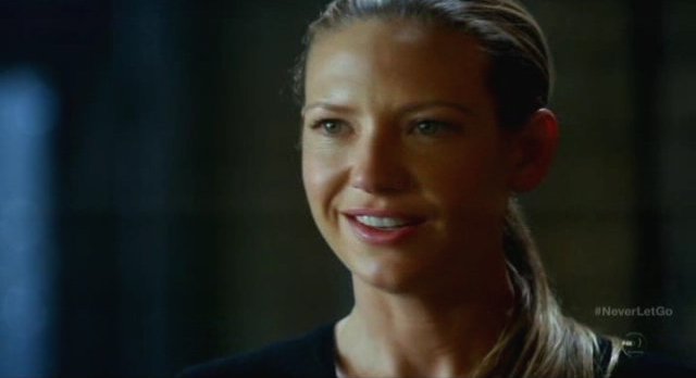 Fringe S5x11 - Olivia smiles at their discovery of Walter's memories