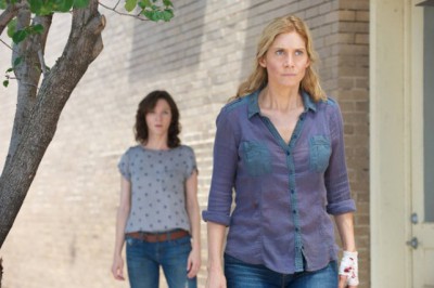 Revolution S2x05 - Cynthia begs Rachel to help find Aaron "One Riot, One Ranger" Episode 205 -- Pictured: (l-r) Jessica Collins as Cynthia, Elizabeth Mitchell as Rachel Matheson -- (Photo by: Felicia Graham/NBC)