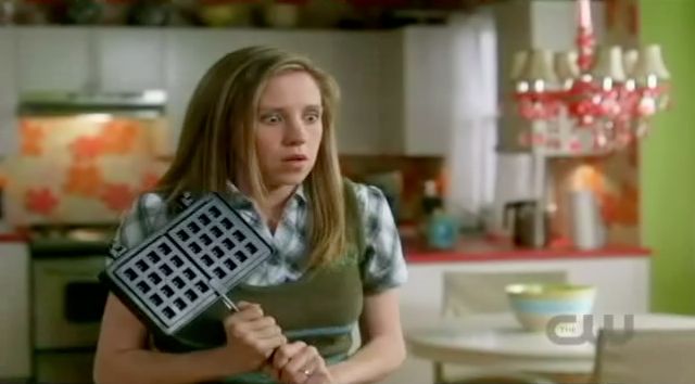 Supernatural S7x08 - Becky hits Sam over the head with their new waffle iron.