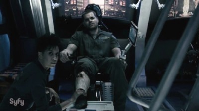 The Expanse S1x05 Naomi tends to Amos who was injured during their escape