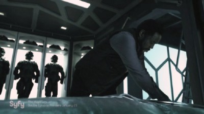 The Expanse S1x06 Johnson extracts the data card from Lopez