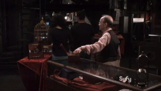 Warehouse 13 S4x14 Monty lifts an artifact